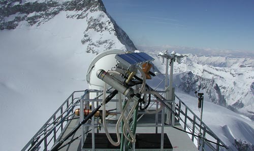 Environmental research station on top of a snowy mountain.