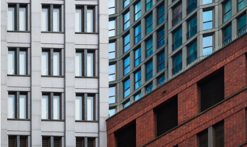 grid pattern of windows across buildings 