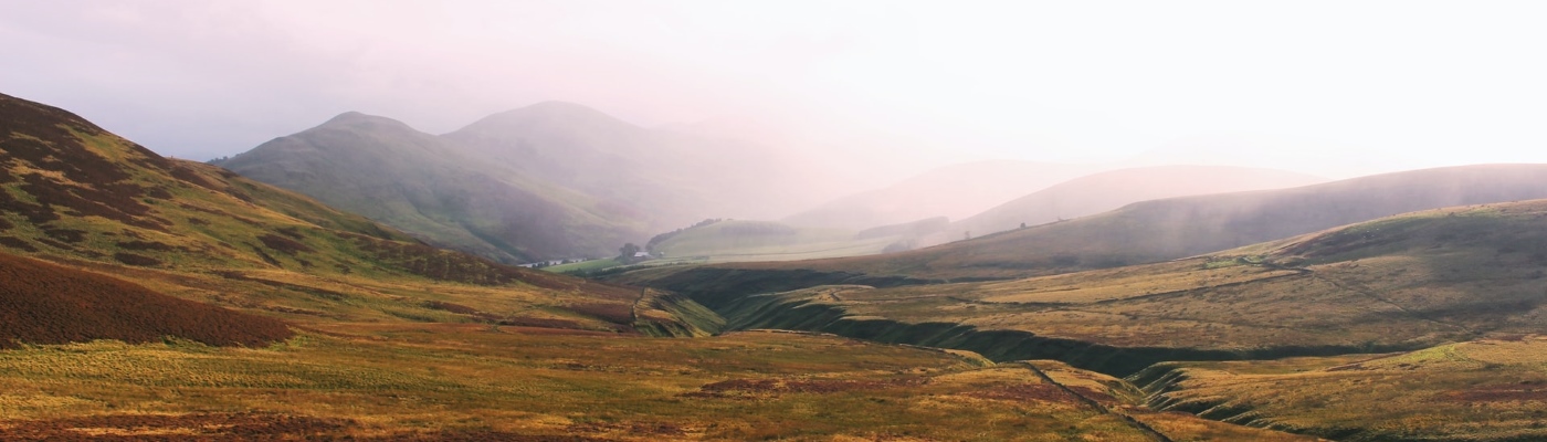 peat moors with foggy mountains in background