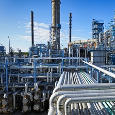 hundreds of pipes forming an outdoor energy plant structure