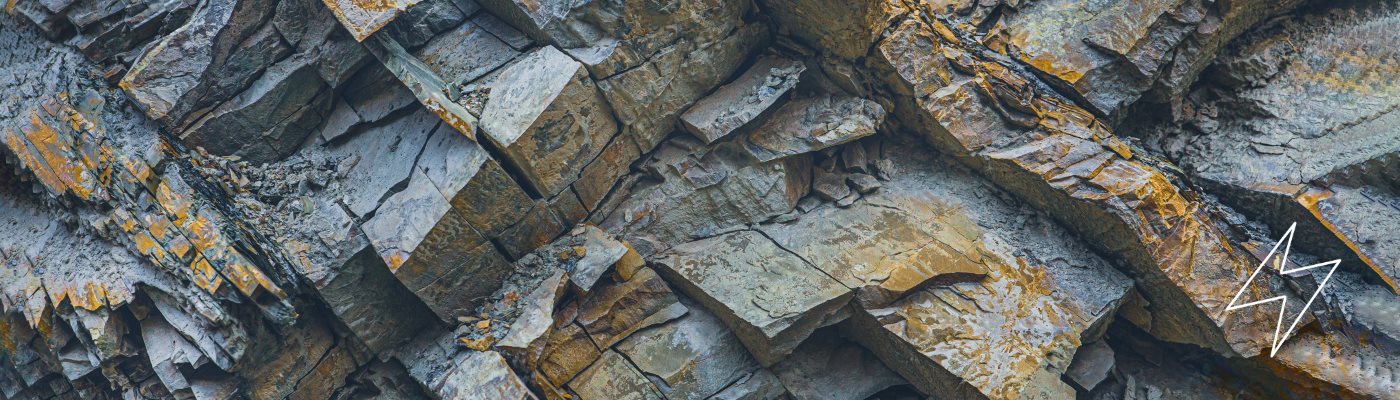 close up image of a grey and brown rock formation 